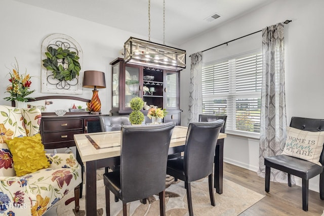 1058 Raccoon Ln, Piney Flats, TN 37686 - dining area with wood finished floors and baseboards