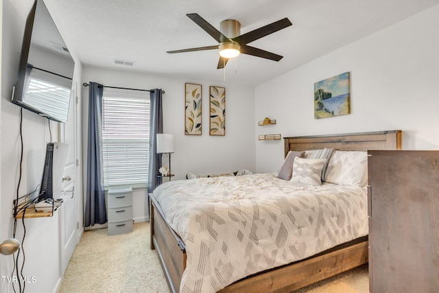 1058 Raccoon Ln, Piney Flats, TN 37686 - bedroom with light colored carpet, ceiling fan, and baseboards