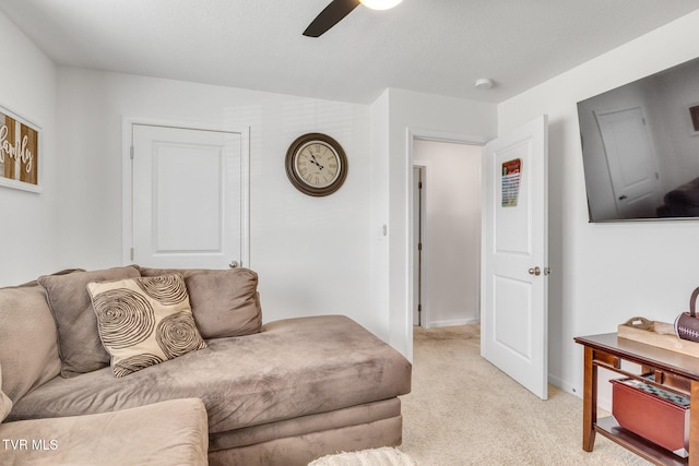 1058 Raccoon Ln, Piney Flats, TN 37686 - living room with ceiling fan, light carpet, and baseboards