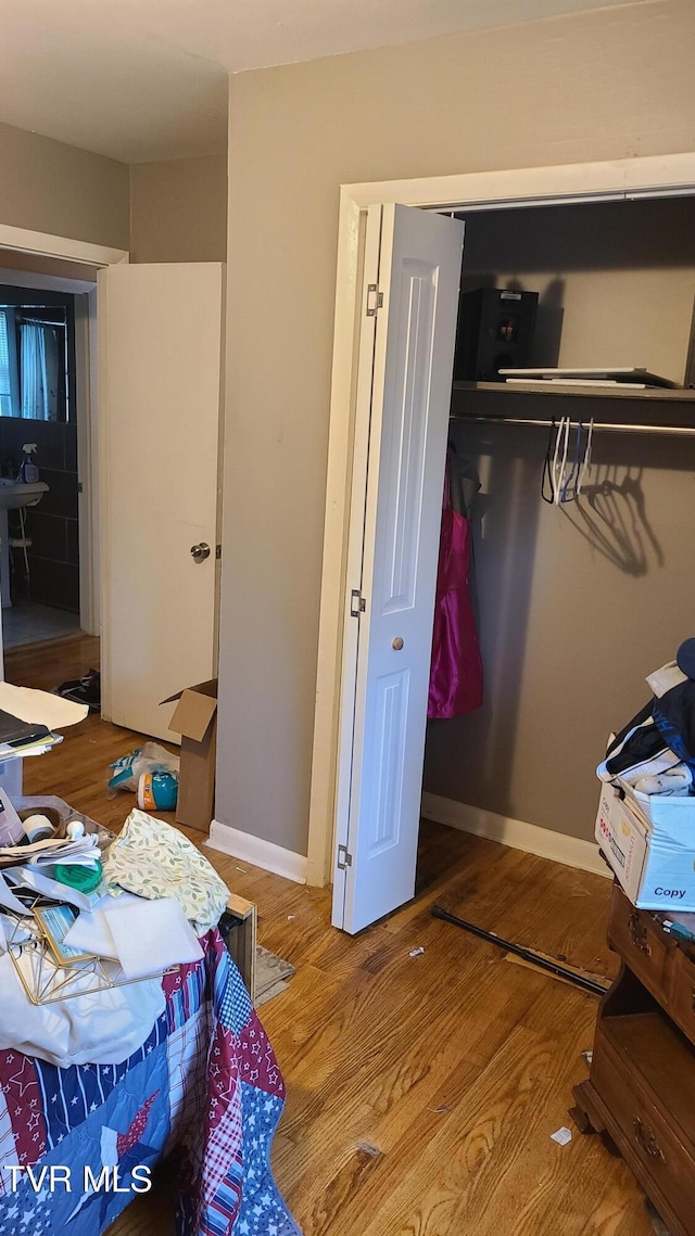 1315 Lowe St, Elizabethton, TN 37643 - bedroom featuring wood finished floors, baseboards, and a closet