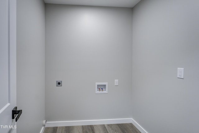 1105 Laurel Way, Mountain City, TN 37683 - laundry room with hookup for an electric dryer, dark wood-style floors, hookup for a washing machine, and baseboards
