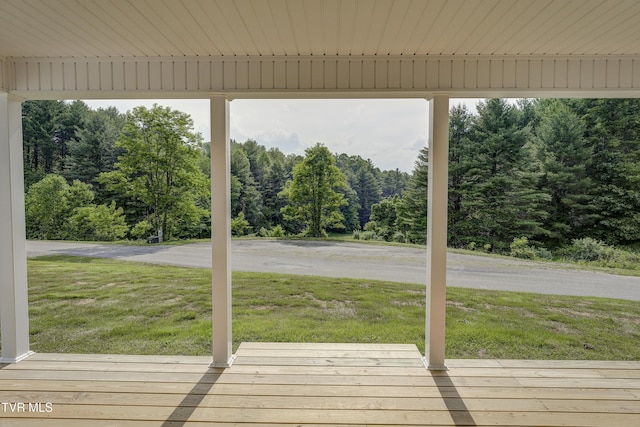 1105 Laurel Way, Mountain City, TN 37683 - deck featuring a yard and a view of trees