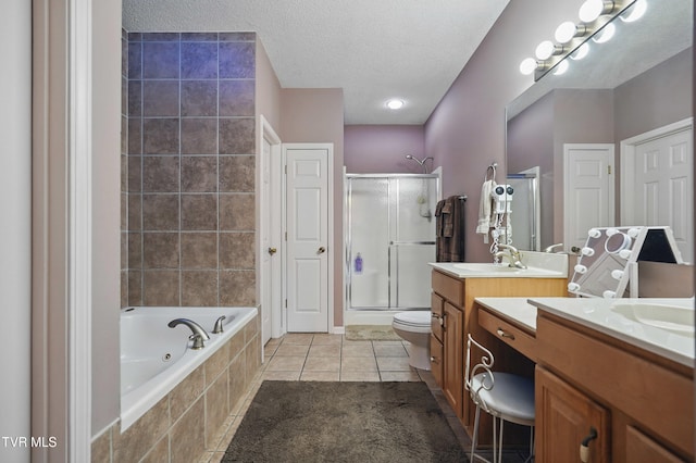 17308 Crabtree Ct, Bristol, VA 24202 - full bathroom featuring a stall shower, vanity, a bath, a textured ceiling, and tile patterned floors
