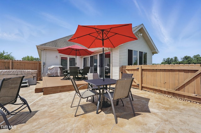 17308 Crabtree Ct, Bristol, VA 24202 - fenced backyard with a patio, outdoor dining space, and grilling area