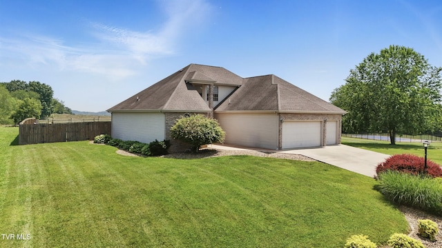 17308 Crabtree Ct, Bristol, VA 24202 - view of front of home featuring an attached garage, driveway, and roof with shingles