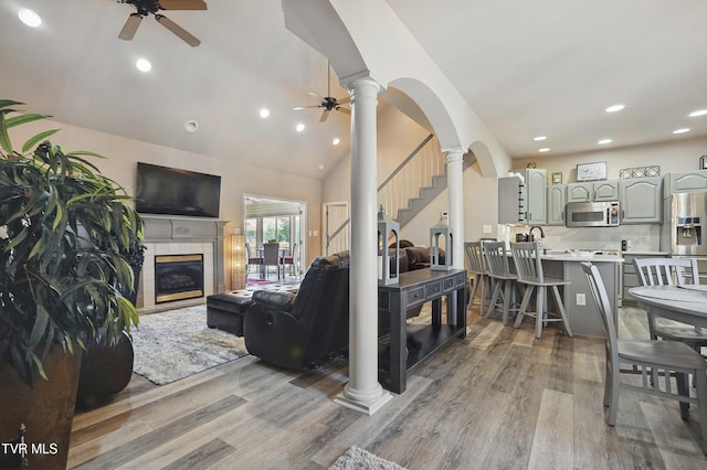17308 Crabtree Ct, Bristol, VA 24202 - living area with a ceiling fan, decorative columns, light wood-style flooring, recessed lighting, and a fireplace
