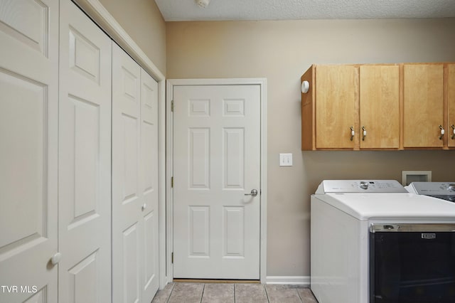 17308 Crabtree Ct, Bristol, VA 24202 - laundry room featuring cabinet space, washer and dryer, light tile patterned floors, and baseboards
