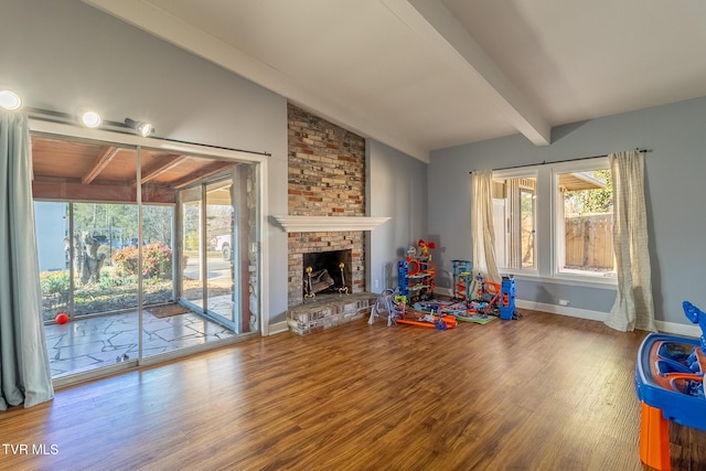 172 Dakota Rd, Bristol, VA 24201 - living room featuring wood finished floors, healthy amount of natural light, and a brick fireplace