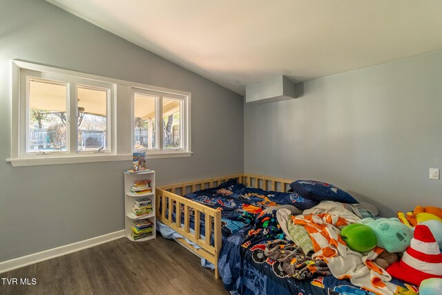 172 Dakota Rd, Bristol, VA 24201 - bedroom with vaulted ceiling and wood finished floors