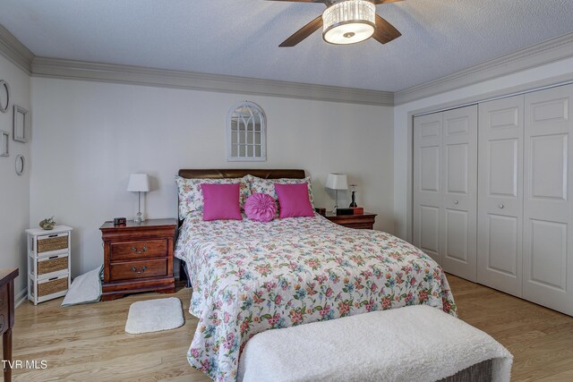 1905 Knob Creek Rd Unit 11, Johnson City, TN 37604 - bedroom with wood finished floors, a closet, ornamental molding, and a ceiling fan