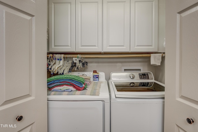 1905 Knob Creek Rd Unit 11, Johnson City, TN 37604 - laundry room featuring washing machine and dryer and cabinet space