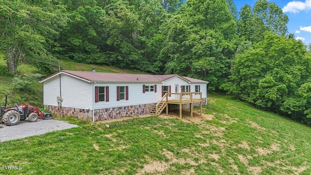 14450 Rattle Creek Rd, Abingdon, VA 24210 - rear view of house featuring a deck, stairway, a yard, and metal roof