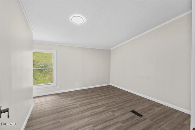 14450 Rattle Creek Rd, Abingdon, VA 24210 - empty room with crown molding, baseboards, wood finished floors, and a textured ceiling