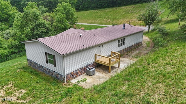 14450 Rattle Creek Rd, Abingdon, VA 24210 - rear view of house with metal roof, central air condition unit, a yard, a patio, and a deck