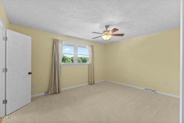 152 Ezee St, Elizabethton, TN 37643 - unfurnished room with a ceiling fan, light colored carpet, and a textured ceiling
