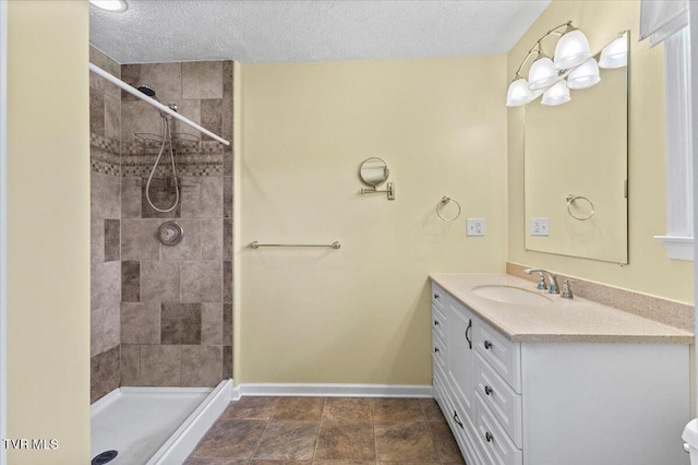 152 Ezee St, Elizabethton, TN 37643 - full bath featuring vanity, a textured ceiling, and tiled shower