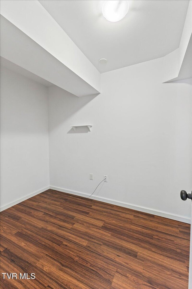 152 Ezee St, Elizabethton, TN 37643 - walk in closet with dark wood-style flooring