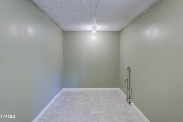 3912 Memorial Blvd, Kingsport, TN 37664 - spare room with a textured ceiling and light tile patterned floors