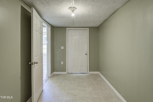 3912 Memorial Blvd, Kingsport, TN 37664 - corridor featuring a textured ceiling