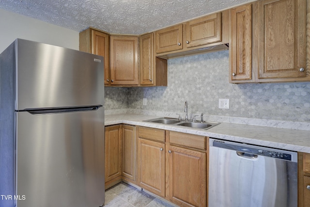 3912 Memorial Blvd, Kingsport, TN 37664 - kitchen featuring appliances with stainless steel finishes, light countertops, and brown cabinetry