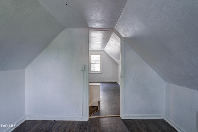 3912 Memorial Blvd, Kingsport, TN 37664 - bonus room with vaulted ceiling, wood finished floors, and a textured ceiling