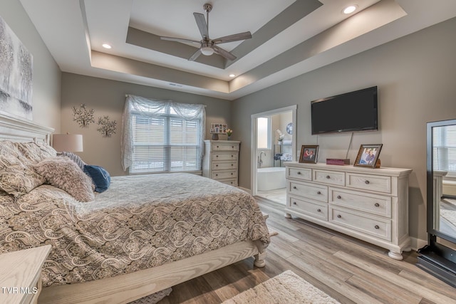 85 Slonaker Cir, Jonesborough, TN 37659 - bedroom featuring a raised ceiling, light wood-type flooring, recessed lighting, connected bathroom, and ceiling fan