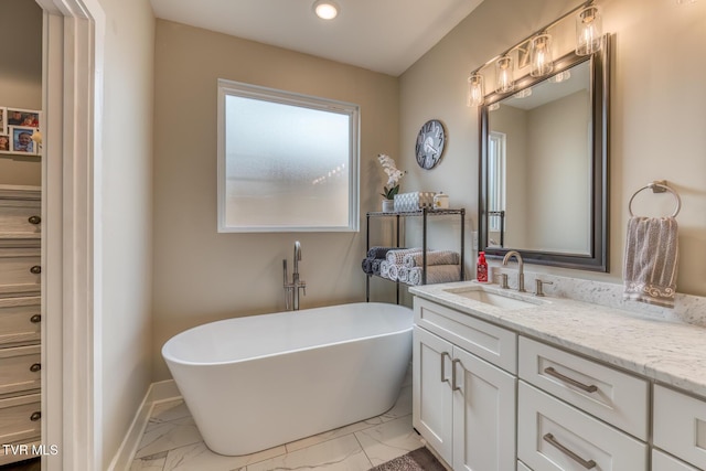 85 Slonaker Cir, Jonesborough, TN 37659 - bathroom with marble look tiles, vanity, a soaking tub, recessed lighting, and baseboards
