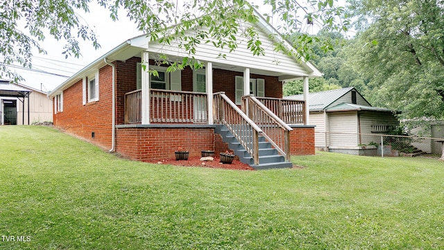 2009 Tenneva St, Kingsport, TN 37665 - view of front of house featuring a porch and brick siding