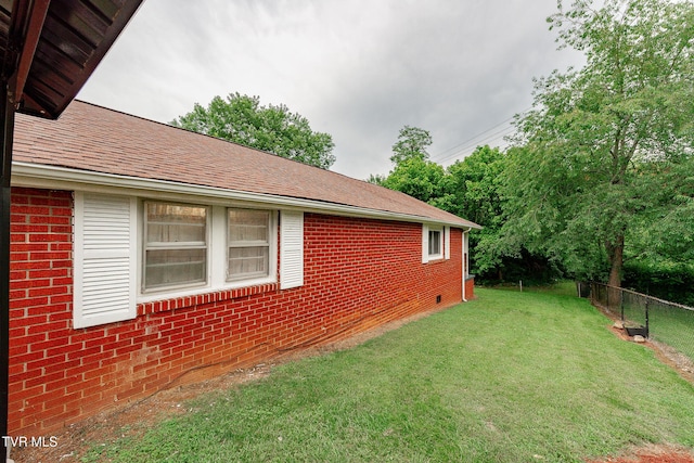 2009 Tenneva St, Kingsport, TN 37665 - view of side of home with brick siding and a shingled roof