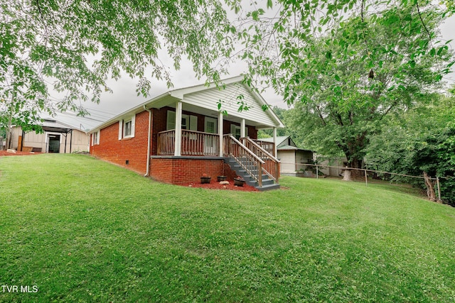 2009 Tenneva St, Kingsport, TN 37665 - view of front facade with a porch, stairs, and brick siding