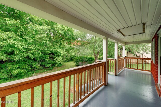 2009 Tenneva St, Kingsport, TN 37665 - wooden porch featuring a yard
