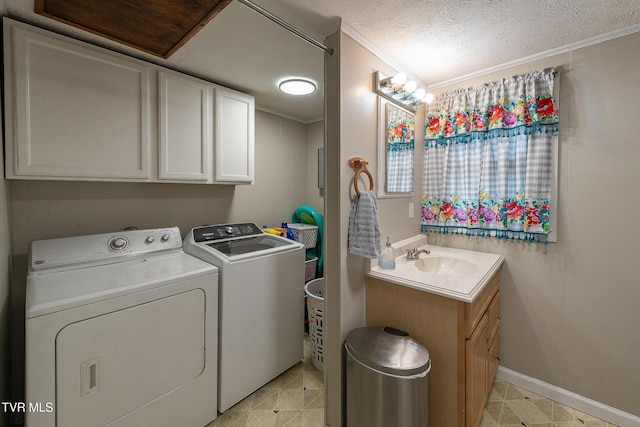 2009 Tenneva St, Kingsport, TN 37665 - washroom with separate washer and dryer, crown molding, baseboards, and light floors