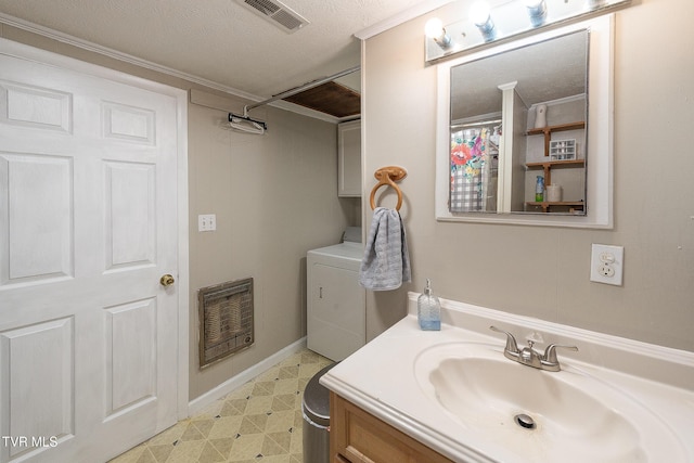 2009 Tenneva St, Kingsport, TN 37665 - full bath with vanity, tile patterned floors, heating unit, baseboards, and washer / clothes dryer