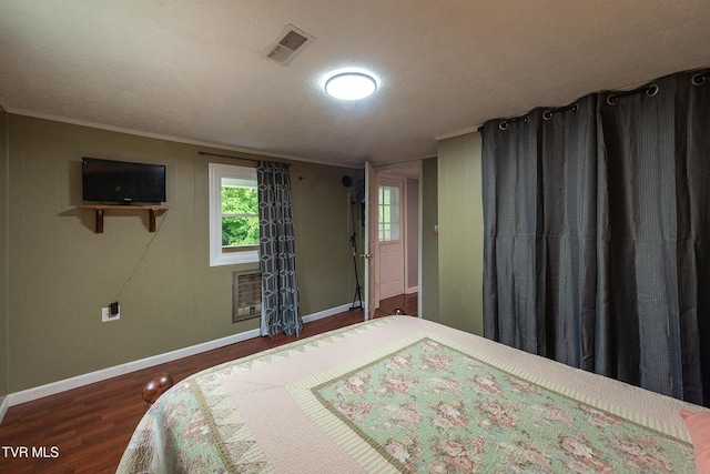 2009 Tenneva St, Kingsport, TN 37665 - bedroom featuring baseboards, wood finished floors, crown molding, and a textured ceiling