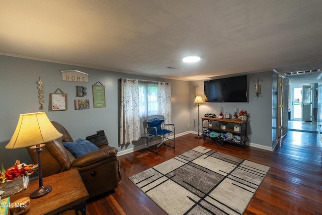 2009 Tenneva St, Kingsport, TN 37665 - living area featuring healthy amount of natural light, wood finished floors, baseboards, and crown molding