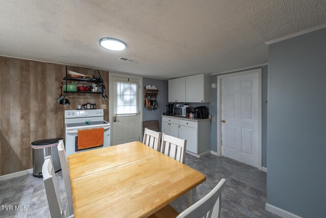 2009 Tenneva St, Kingsport, TN 37665 - dining area featuring a textured ceiling and baseboards