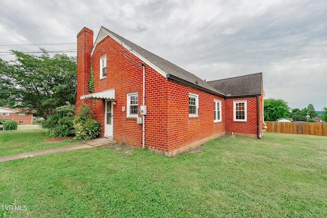 1024 Sharondale Ave, Kingsport, TN 37660 - view of side of home with brick siding, a chimney, and roof with shingles