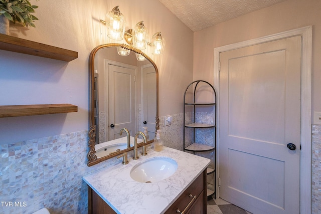 1024 Sharondale Ave, Kingsport, TN 37660 - bathroom with vanity, wainscoting, a textured ceiling, and tile walls