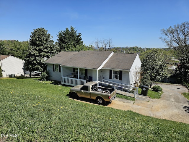 1027 Penny Ln, Morristown, TN 37814 - view of front of property with covered porch, a front lawn, and concrete driveway