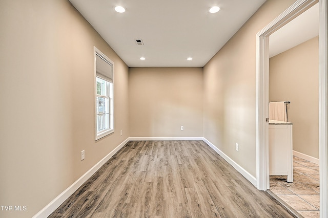 660 S Jena Beth Dr Unit 1, Elizabethton, TN 37643 - spare room featuring light wood-style floors and recessed lighting