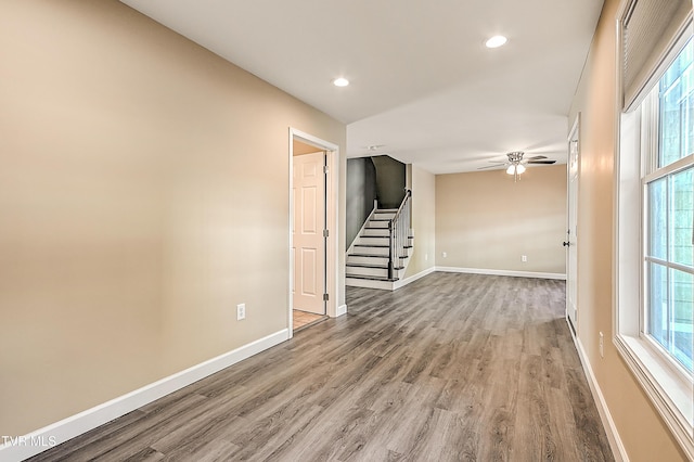 660 S Jena Beth Dr Unit 1, Elizabethton, TN 37643 - spare room with stairway, wood finished floors, a ceiling fan, plenty of natural light, and recessed lighting