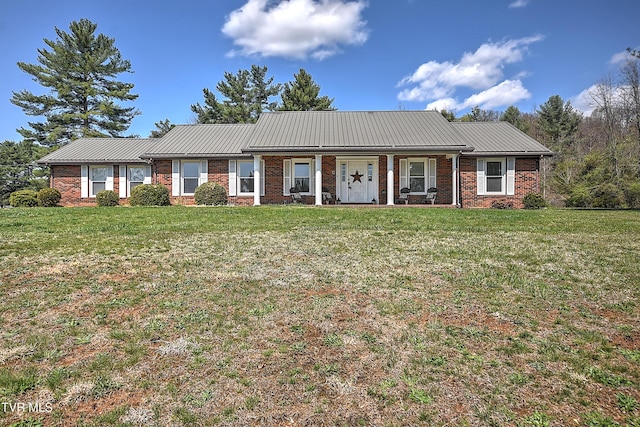 646 Meadow View Rd, Bristol, TN 37620 - single story home featuring metal roof, a front yard, and brick siding