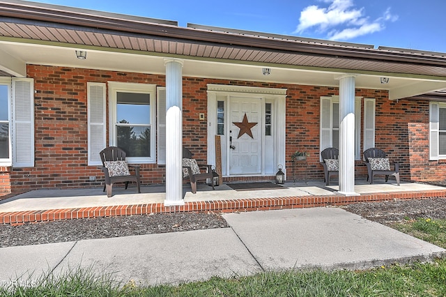 646 Meadow View Rd, Bristol, TN 37620 - doorway to property featuring a porch and brick siding