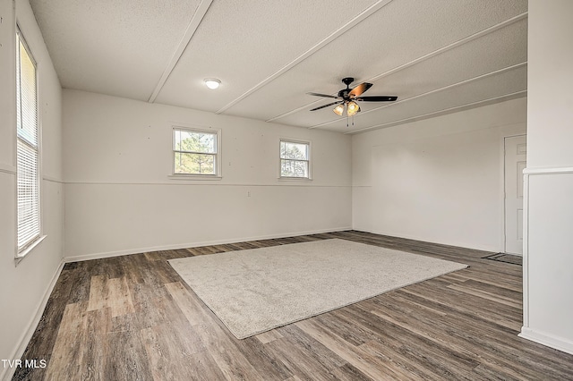 646 Meadow View Rd, Bristol, TN 37620 - unfurnished room featuring wood finished floors, a textured ceiling, ceiling fan, and baseboards