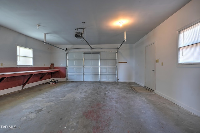 646 Meadow View Rd, Bristol, TN 37620 - garage featuring baseboards and a garage door opener
