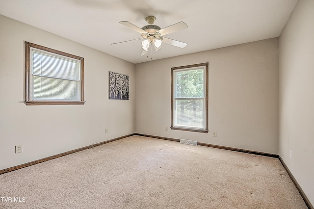 646 Meadow View Rd, Bristol, TN 37620 - unfurnished room featuring light colored carpet, ceiling fan, and baseboards