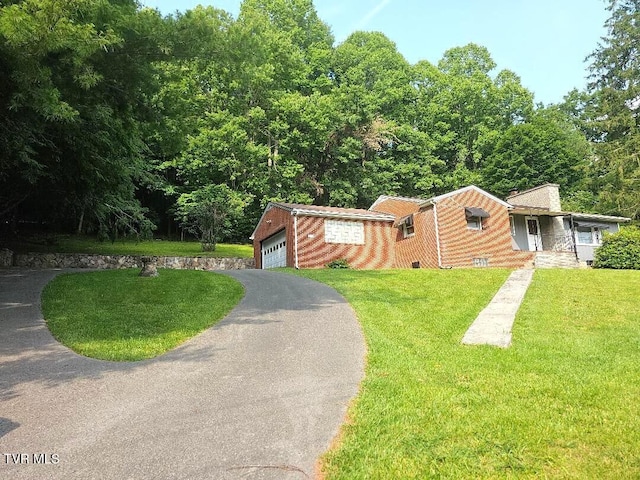 919 Coeburn Rd, Wise, VA 24293 - ranch-style house featuring a front yard and driveway