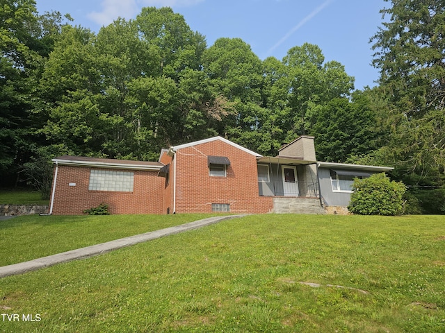919 Coeburn Rd, Wise, VA 24293 - ranch-style house featuring a front yard, brick siding, and a chimney