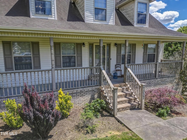 1032 Austin Ridge Ct, Piney Flats, TN 37686 - property entrance with a porch and roof with shingles