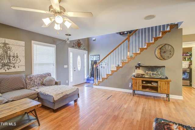 1032 Austin Ridge Ct, Piney Flats, TN 37686 - living area with wood finished floors, stairs, and ceiling fan